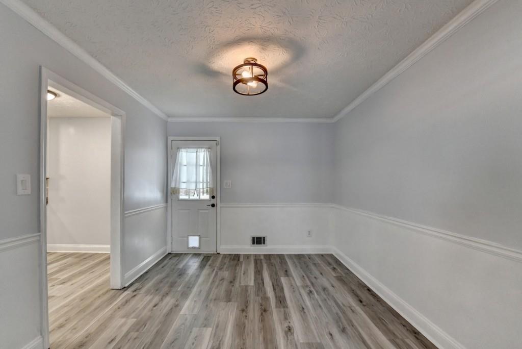 351 Cottonpatch Road Lawrenceville, GA 30046 - Photo 12 of 47 a view of a room with wooden floor