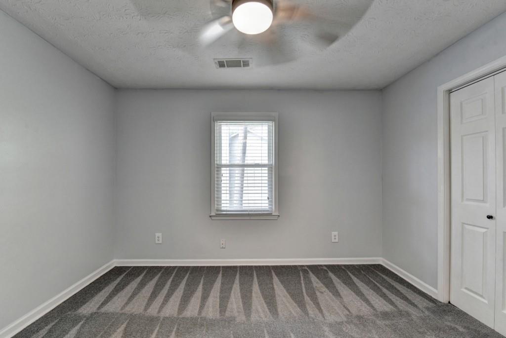 351 Cottonpatch Road Lawrenceville, GA 30046 - Photo 27 of 47 an empty room with a window