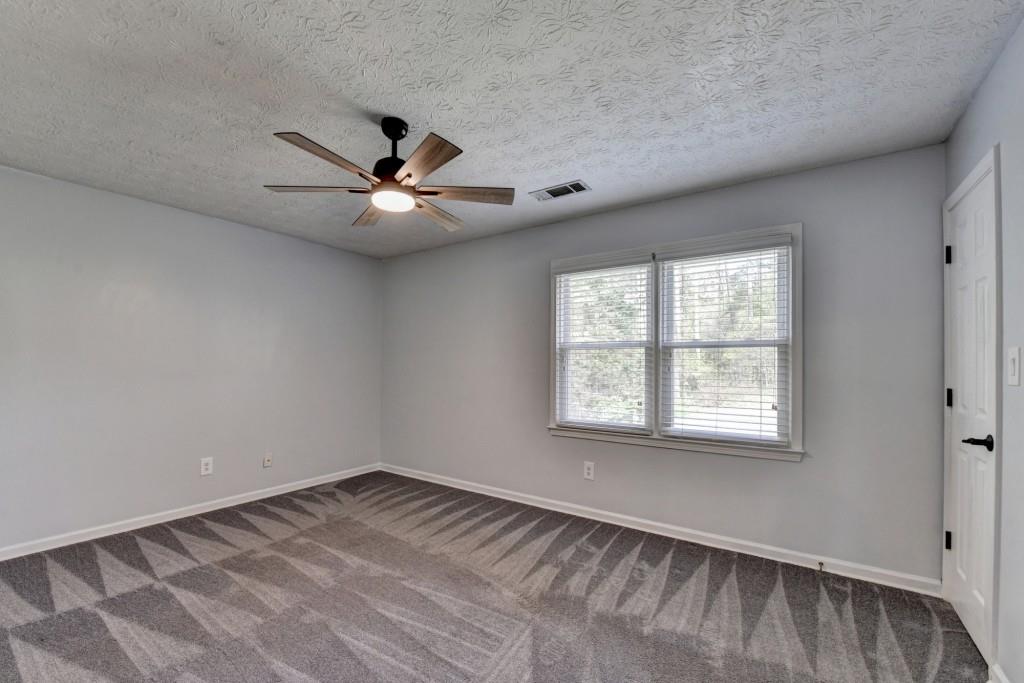 351 Cottonpatch Road Lawrenceville, GA 30046 - Photo 31 of 47 a view of an empty room with a window