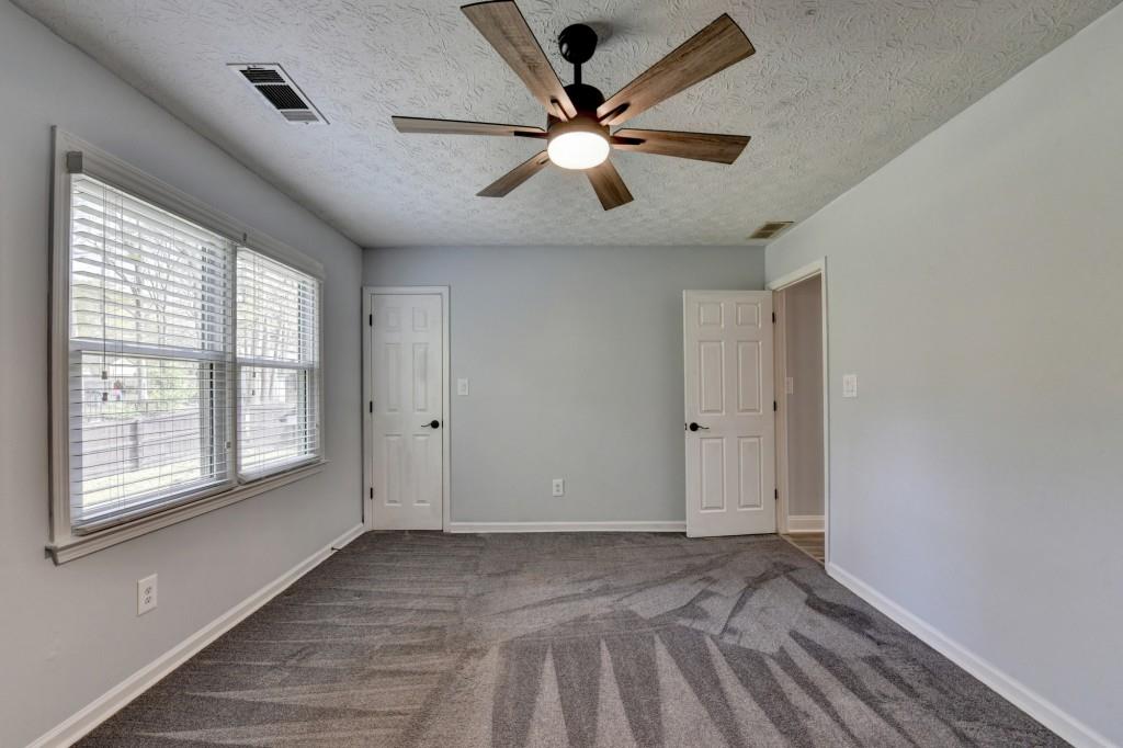 351 Cottonpatch Road Lawrenceville, GA 30046 - Photo 33 of 47 a view of an empty room with a window