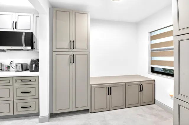 a workspace with furniture and window