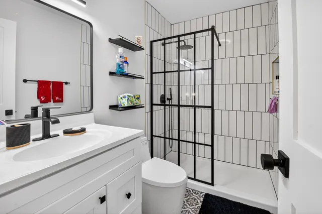 a view of balcony with wooden floor