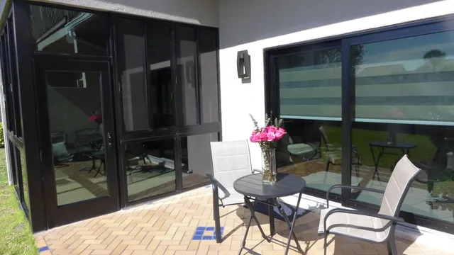 a kitchen with stainless steel appliances a stove microwave and refrigerator