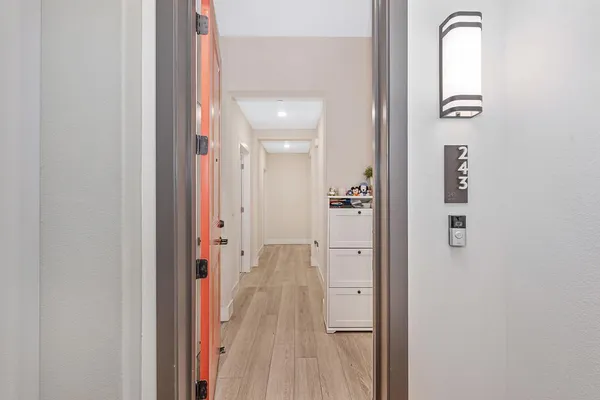 a view of kitchen with wooden floor