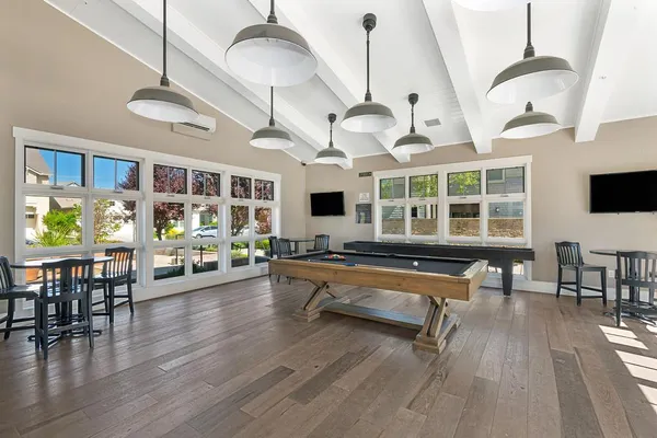 a view of a hallway with wooden shelves