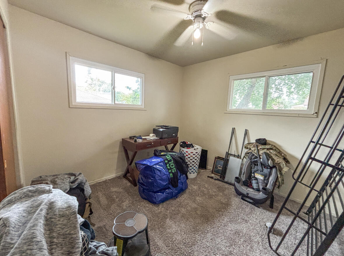 6844 Ridgeland Avenue Hammond, IN 46324 - Photo 11 of 21 a bed room with furniture and a window
