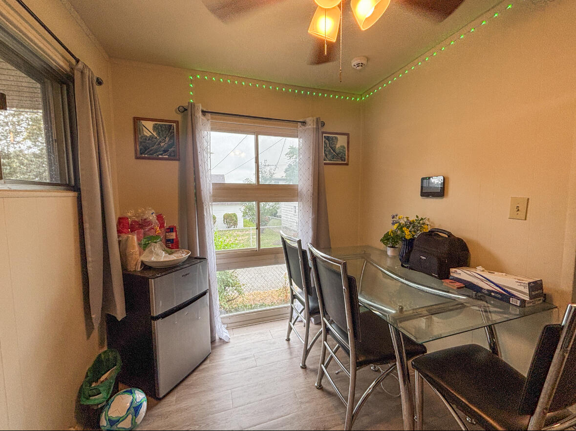6844 Ridgeland Avenue Hammond, IN 46324 - Photo 5 of 21 a view of a dining room with furniture window and outside view