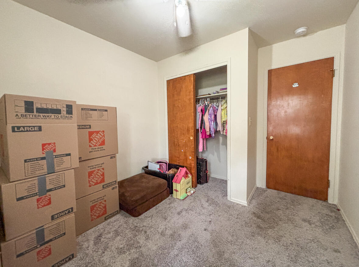 6844 Ridgeland Avenue Hammond, IN 46324 - Photo 10 of 21 a bedroom with a bed and a closet
