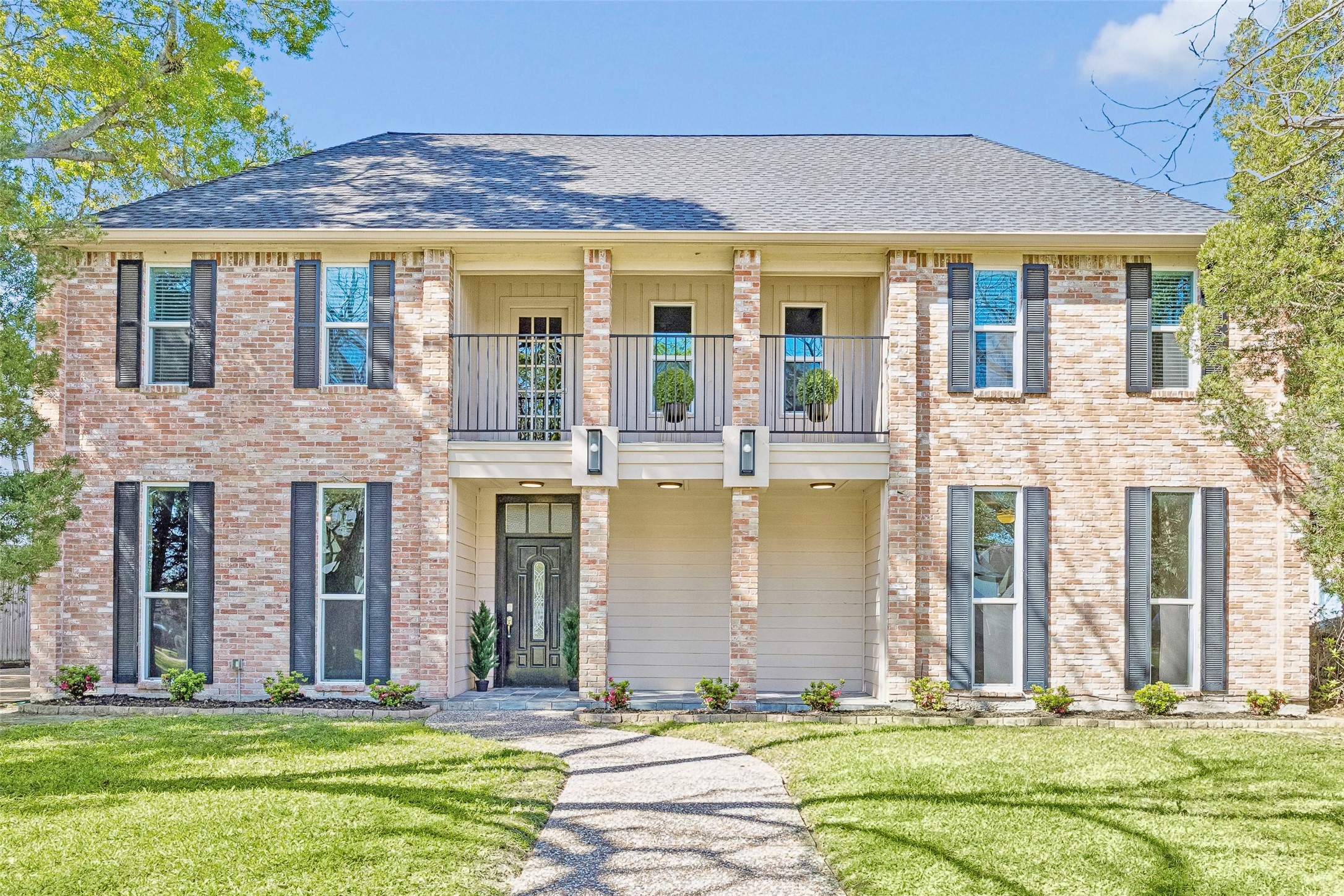 1030 Crossroads Drive Houston, TX 77079 - Photo 1 of 44 a front view of a house