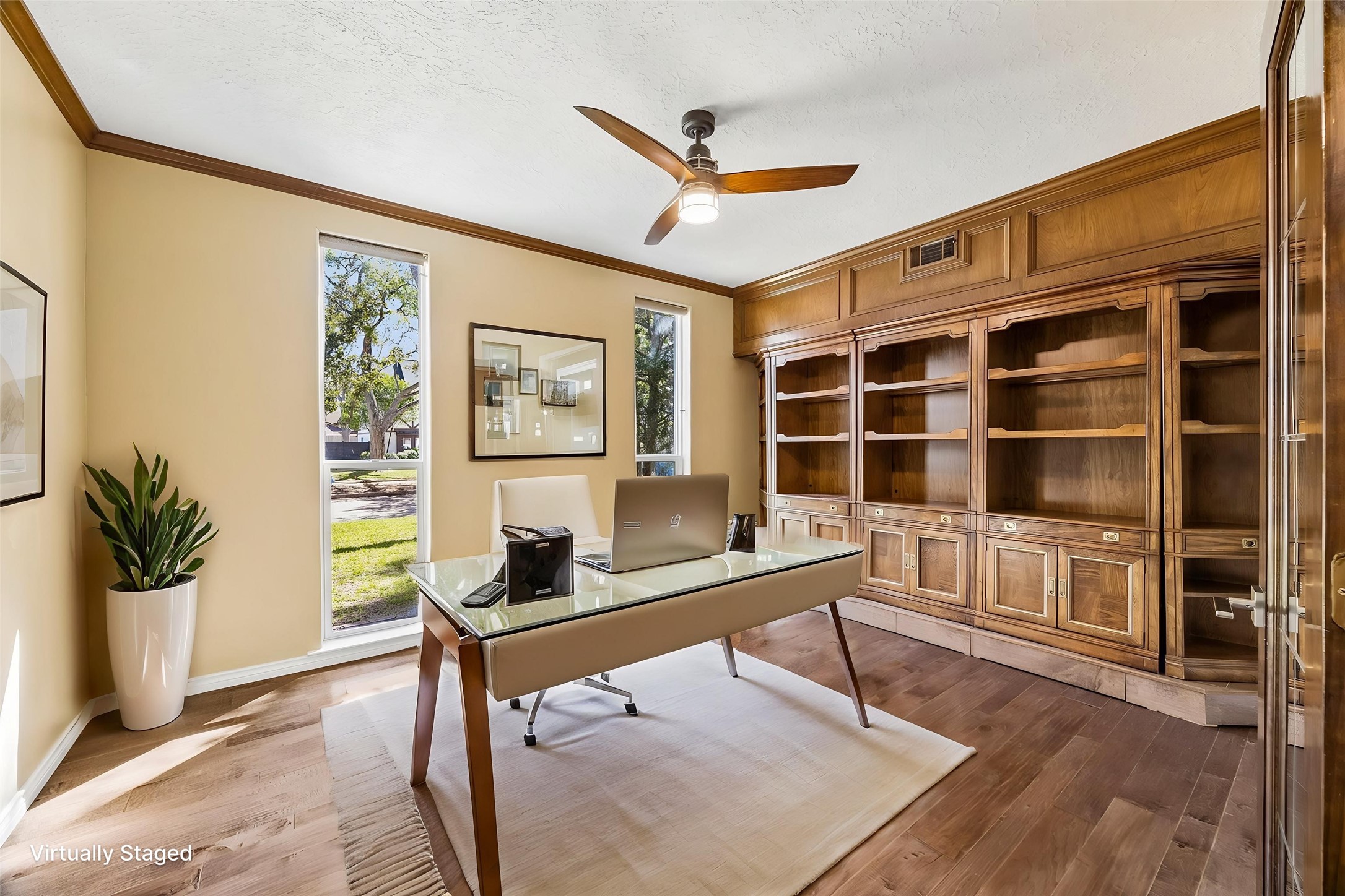 1030 Crossroads Drive Houston, TX 77079 - Photo 16 of 44 a workspace with furniture and window