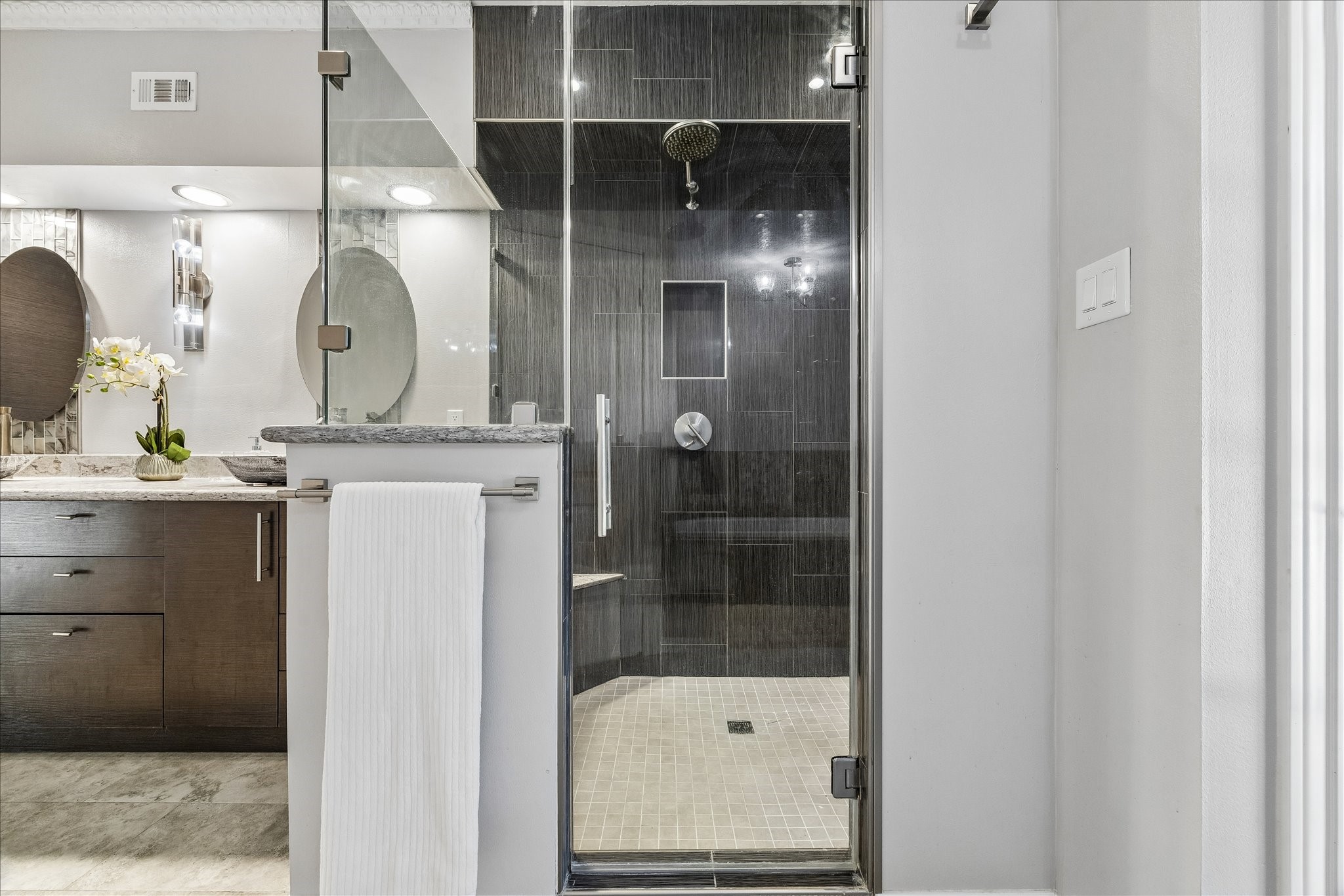 1030 Crossroads Drive Houston, TX 77079 - Photo 24 of 44 a bathroom with a sink and a mirror