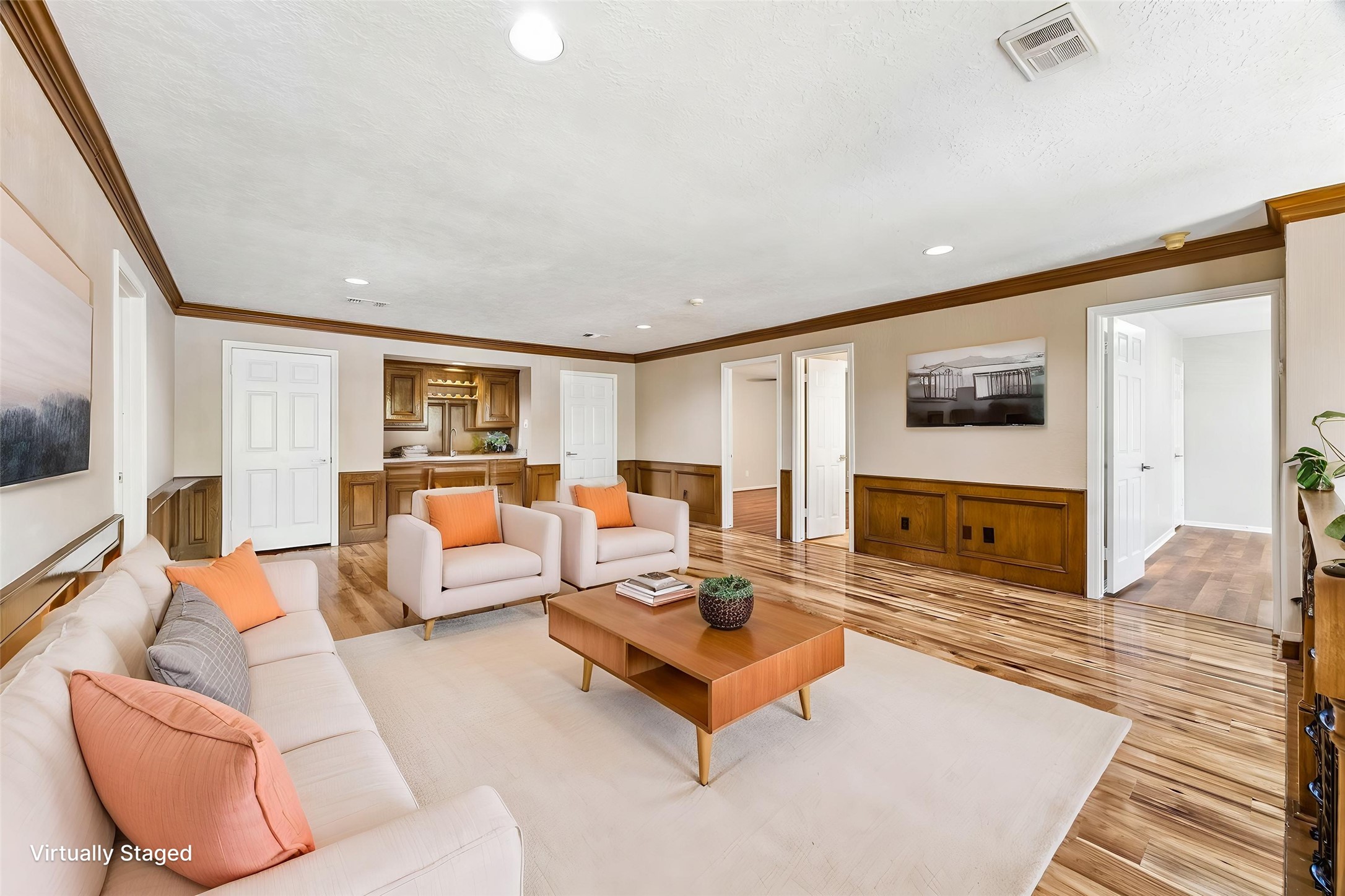 1030 Crossroads Drive Houston, TX 77079 - Photo 28 of 44 a living room with furniture wooden floor and a flat screen tv