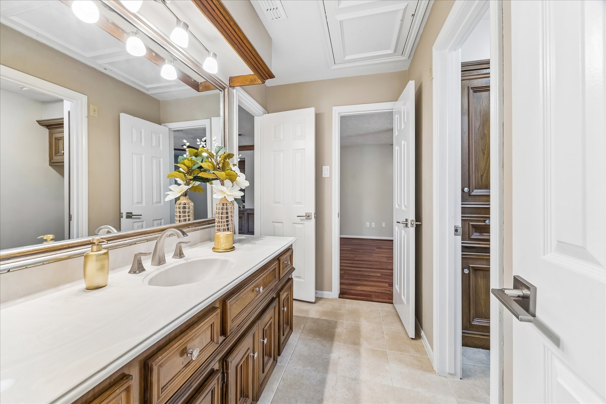 1030 Crossroads Drive Houston, TX 77079 - Photo 32 of 44 a bathroom with a sink double vanity and a mirror