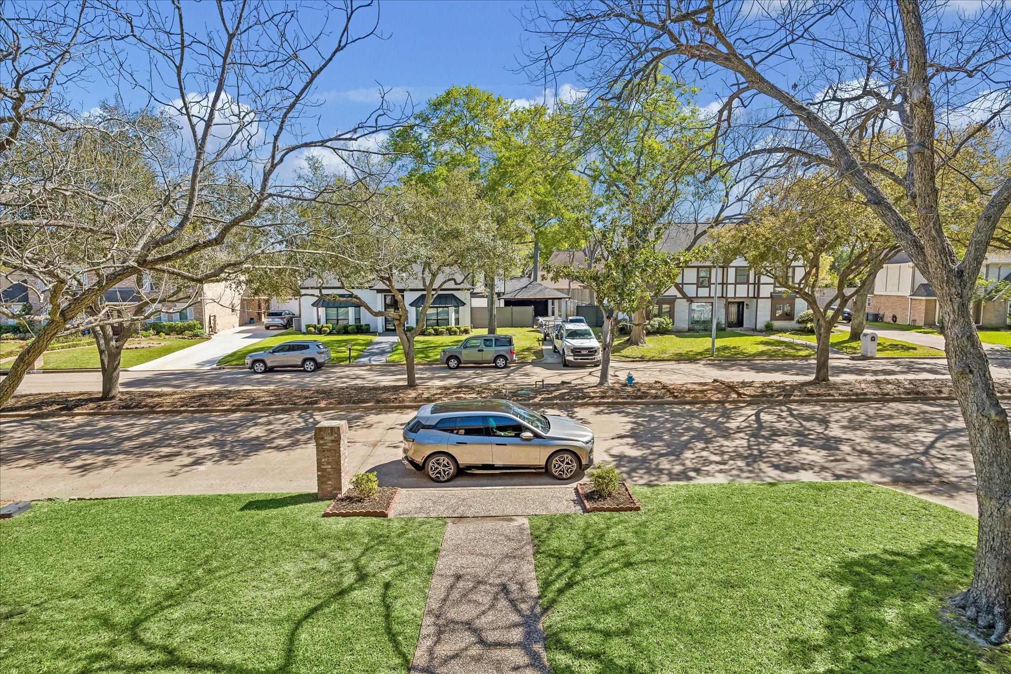 1030 Crossroads Drive Houston, TX 77079 - Photo 41 of 44 Beautiful views of this incredible neighborhood from the second-floor balcony, offering a peaceful and elevated perspective of the surrounding area.