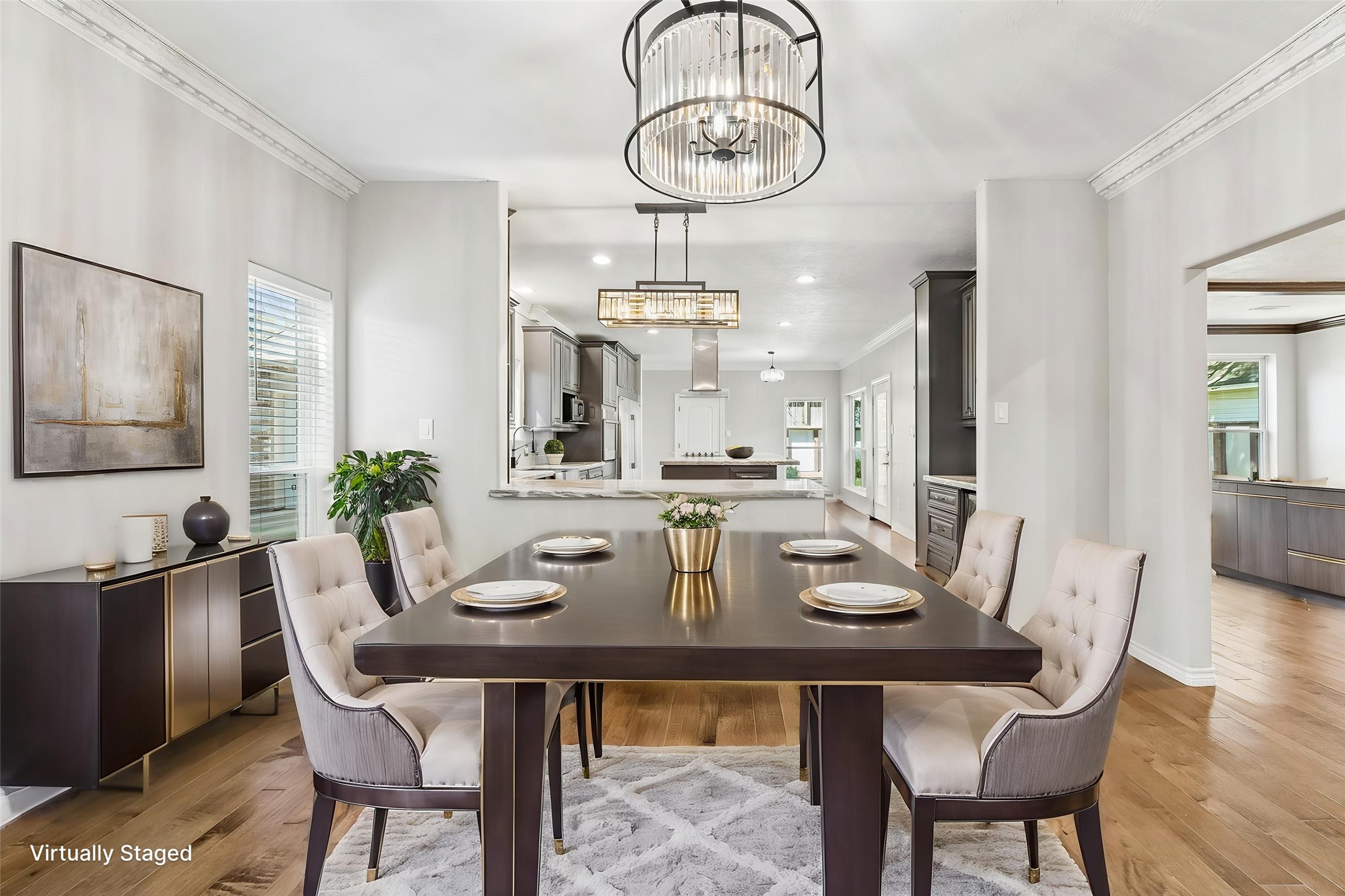 1030 Crossroads Drive Houston, TX 77079 - Photo 5 of 44 a view of a dining room with furniture a chandelier and wooden floor