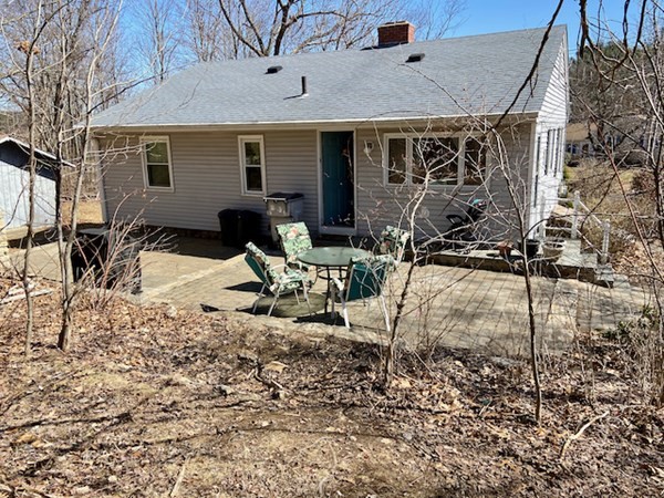 23 Adams Road Grafton, MA 01519 - Photo 10 of 32 a view of house with backyard and sitting area