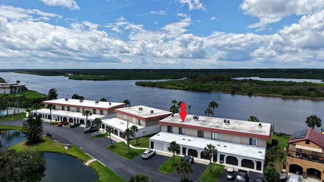 a view of building with lake view and mountain view