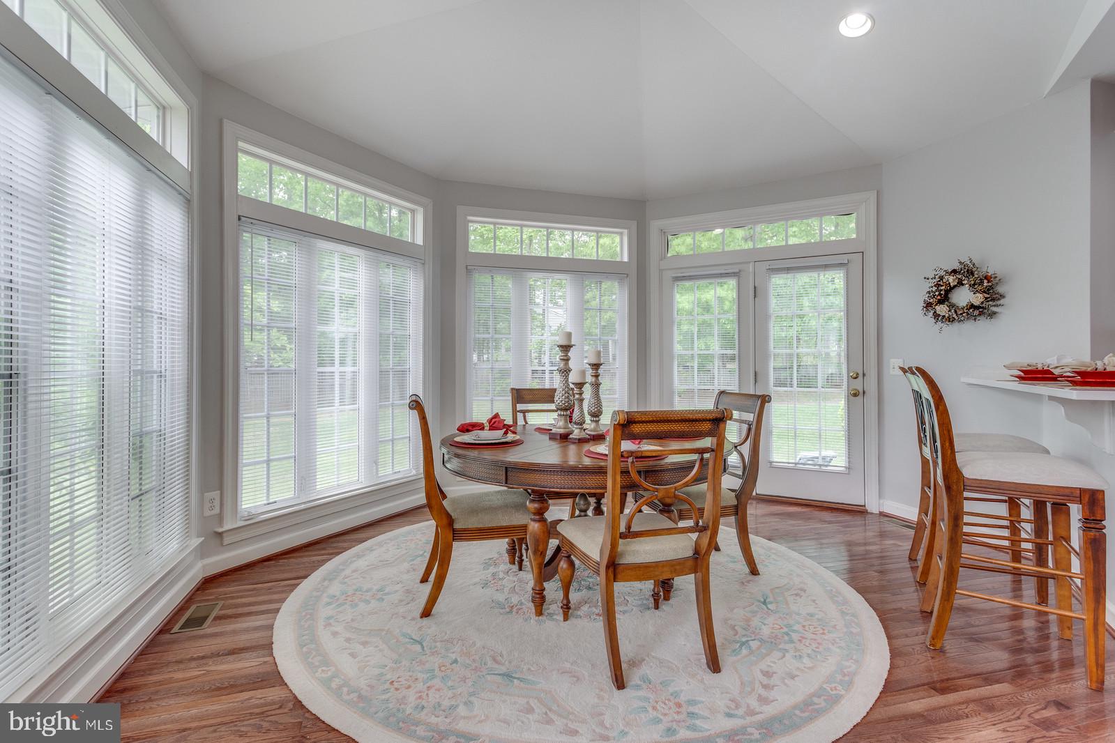 5010 Devin Green Lane Fairfax, VA 22030 - Photo 15 of 53 Room for a good-sized table-opens to slate patio