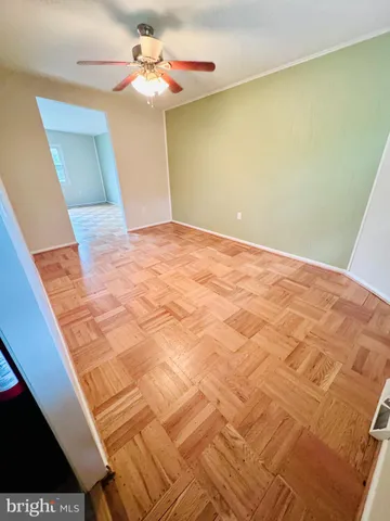 a view of a big room with windows