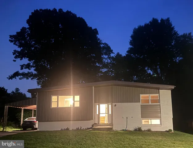 a view of house with backyard porch and entertaining space