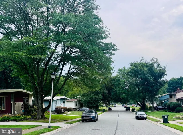 a car parked in front of a house