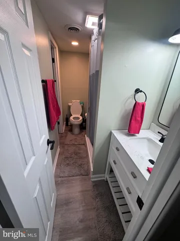 a view of living room with furniture and a flat screen tv