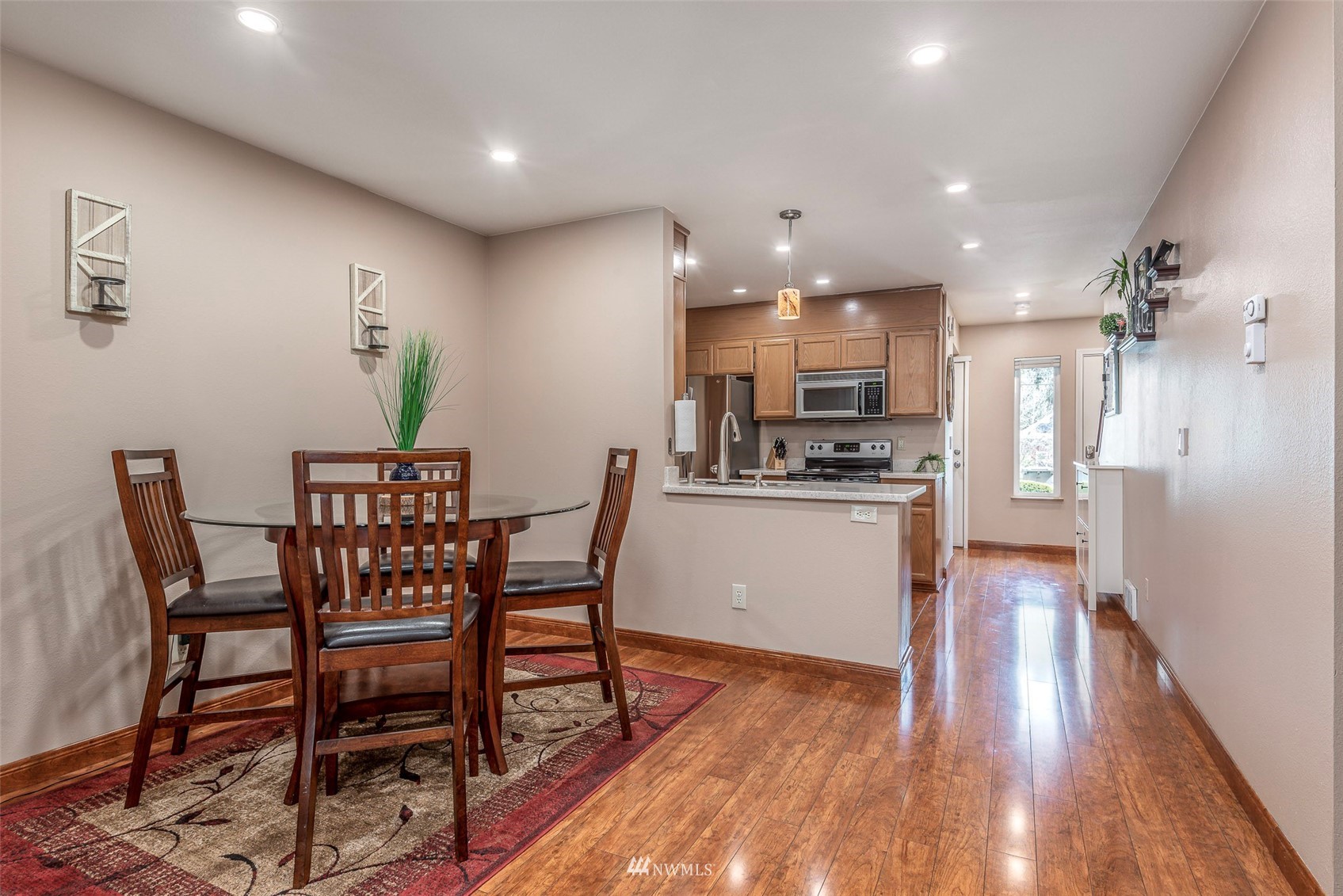 3420 Morrison Road West University Place, WA 98466 - Photo 16 of 40 a kitchen with a table and chairs in it