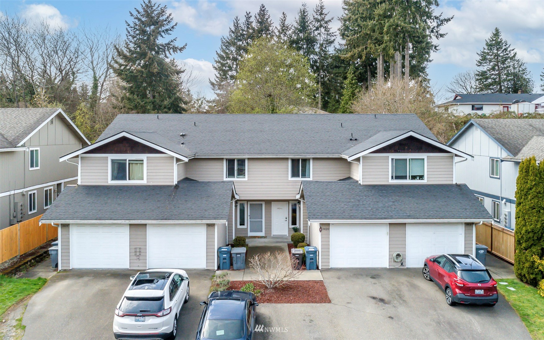 3420 Morrison Road West University Place, WA 98466 - Photo 5 of 40 a front view of a house with a garden