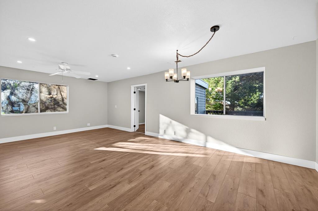 3901 Luneman Road Placerville, CA 95667 - Photo 11 of 56 a view of empty room with wooden floor and window