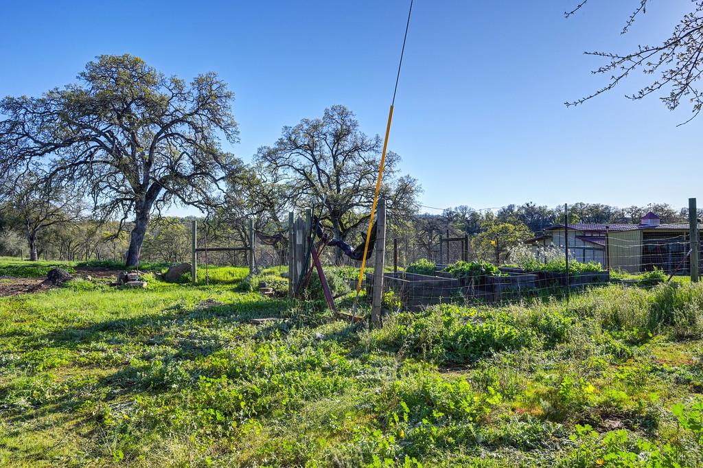 3901 Luneman Road Placerville, CA 95667 - Photo 30 of 56 a view of a lake with a house in background