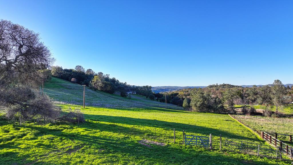 3901 Luneman Road Placerville, CA 95667 - Photo 38 of 56 a view of a lake with a big yard