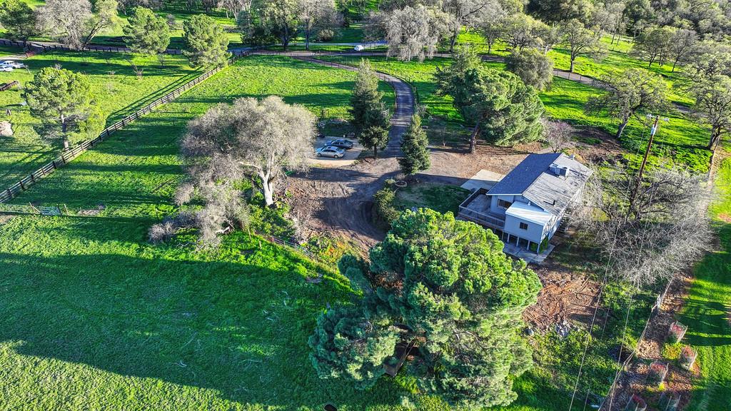 3901 Luneman Road Placerville, CA 95667 - Photo 42 of 56 a view of a garden with a fountain