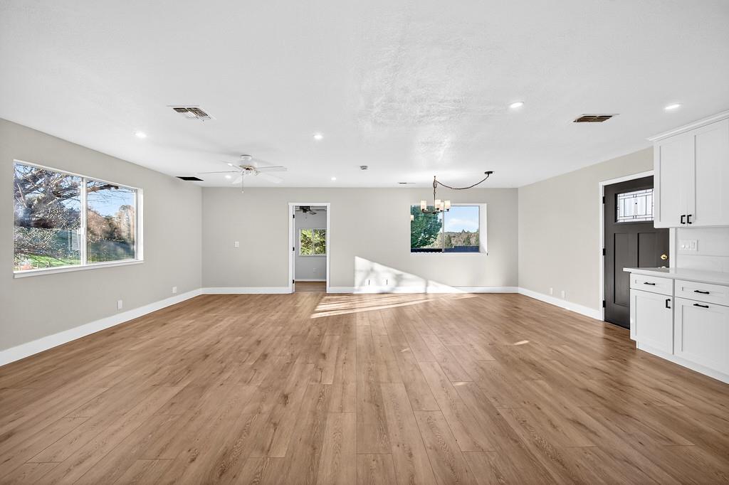 3901 Luneman Road Placerville, CA 95667 - Photo 6 of 56 a view of a kitchen with wooden floor and a window