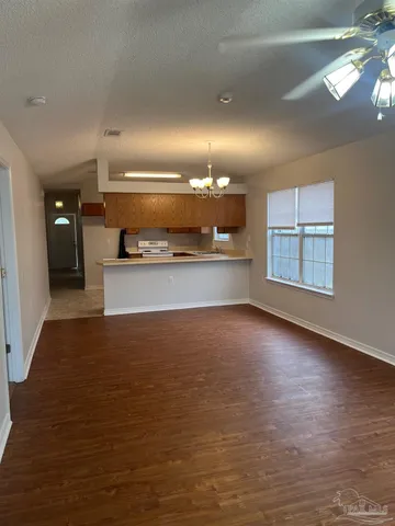 a view of kitchen and a window