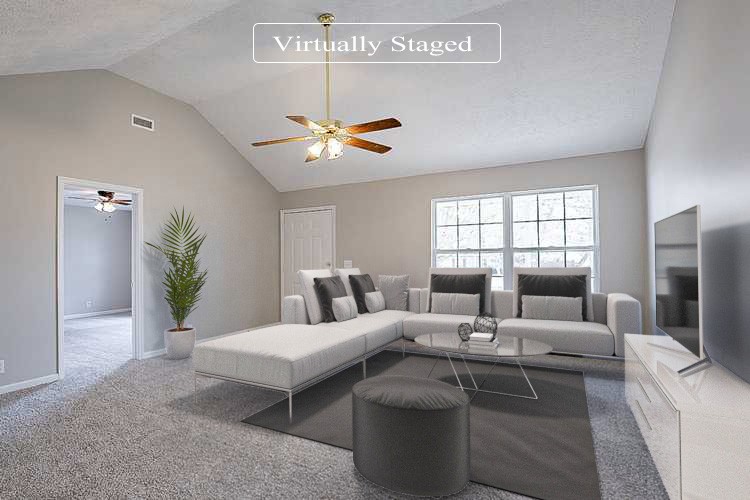 692 Crescent Road Murfreesboro, TN 37128 - Photo 2 of 23 a living room with furniture a chandelier and a flat screen tv