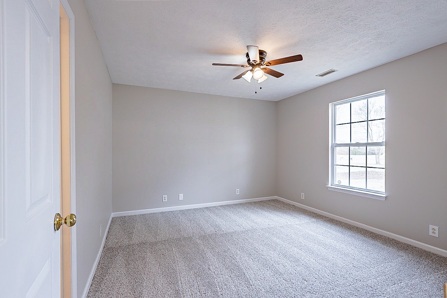 692 Crescent Road Murfreesboro, TN 37128 - Photo 12 of 23 an empty room with windows and fan