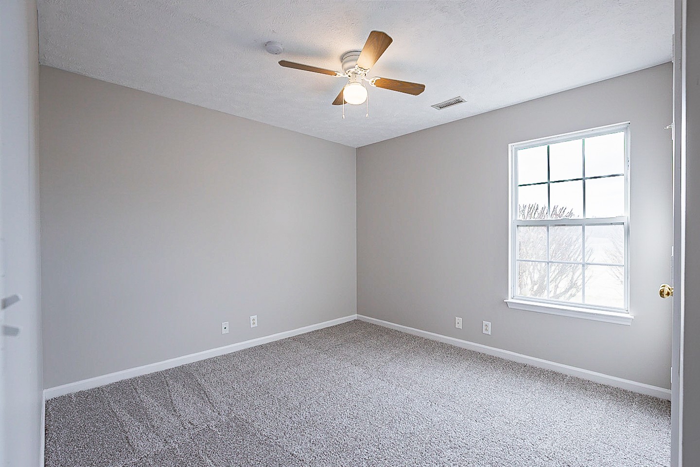 692 Crescent Road Murfreesboro, TN 37128 - Photo 13 of 23 an empty room with a window and a ceiling fan