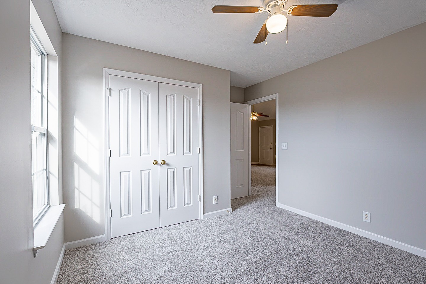 692 Crescent Road Murfreesboro, TN 37128 - Photo 14 of 23 a view of a livingroom with a ceiling fan and window