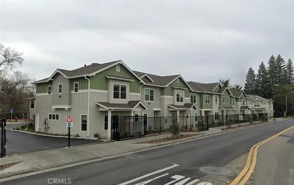 a view of a street with houses