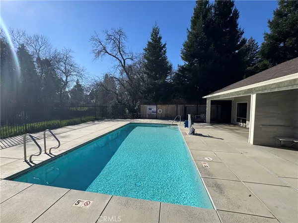 a view of a backyard with a patio