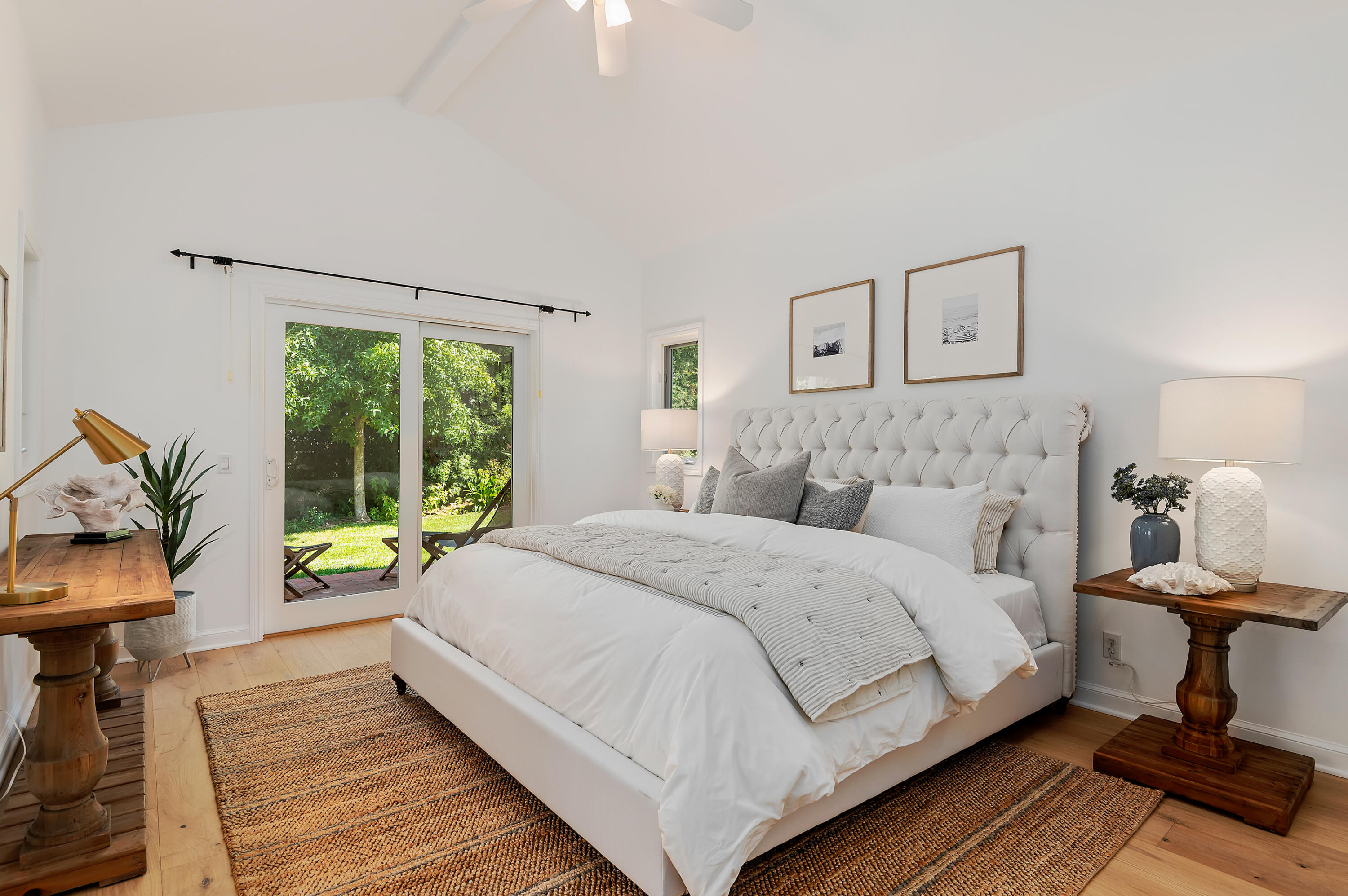 3848-2 Crescent Drive Santa Barbara, CA 93110 - Photo 15 of 32 a bedroom with a bed and wooden floor