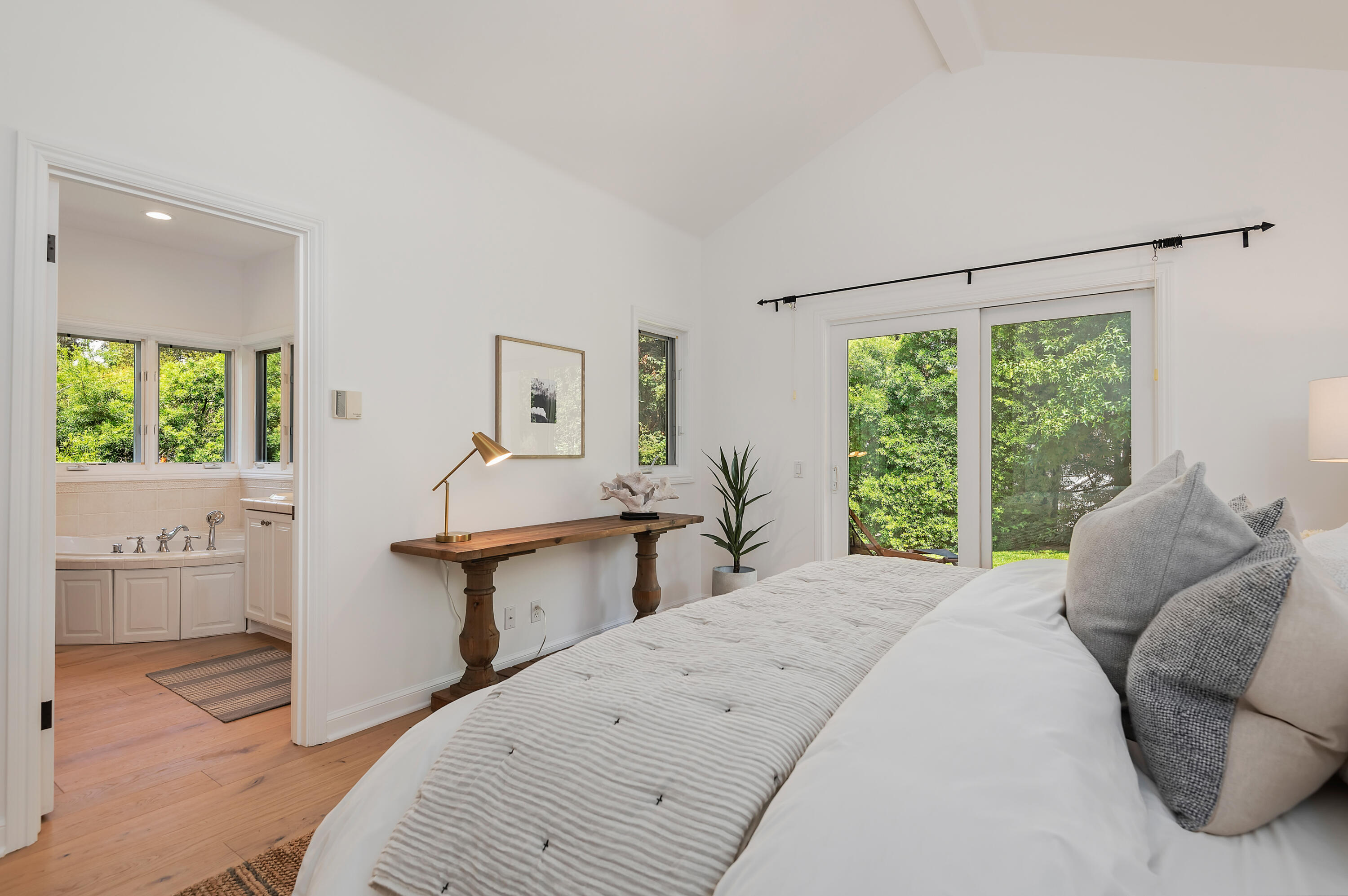 3848-2 Crescent Drive Santa Barbara, CA 93110 - Photo 16 of 32 a bedroom with a bed and a large window