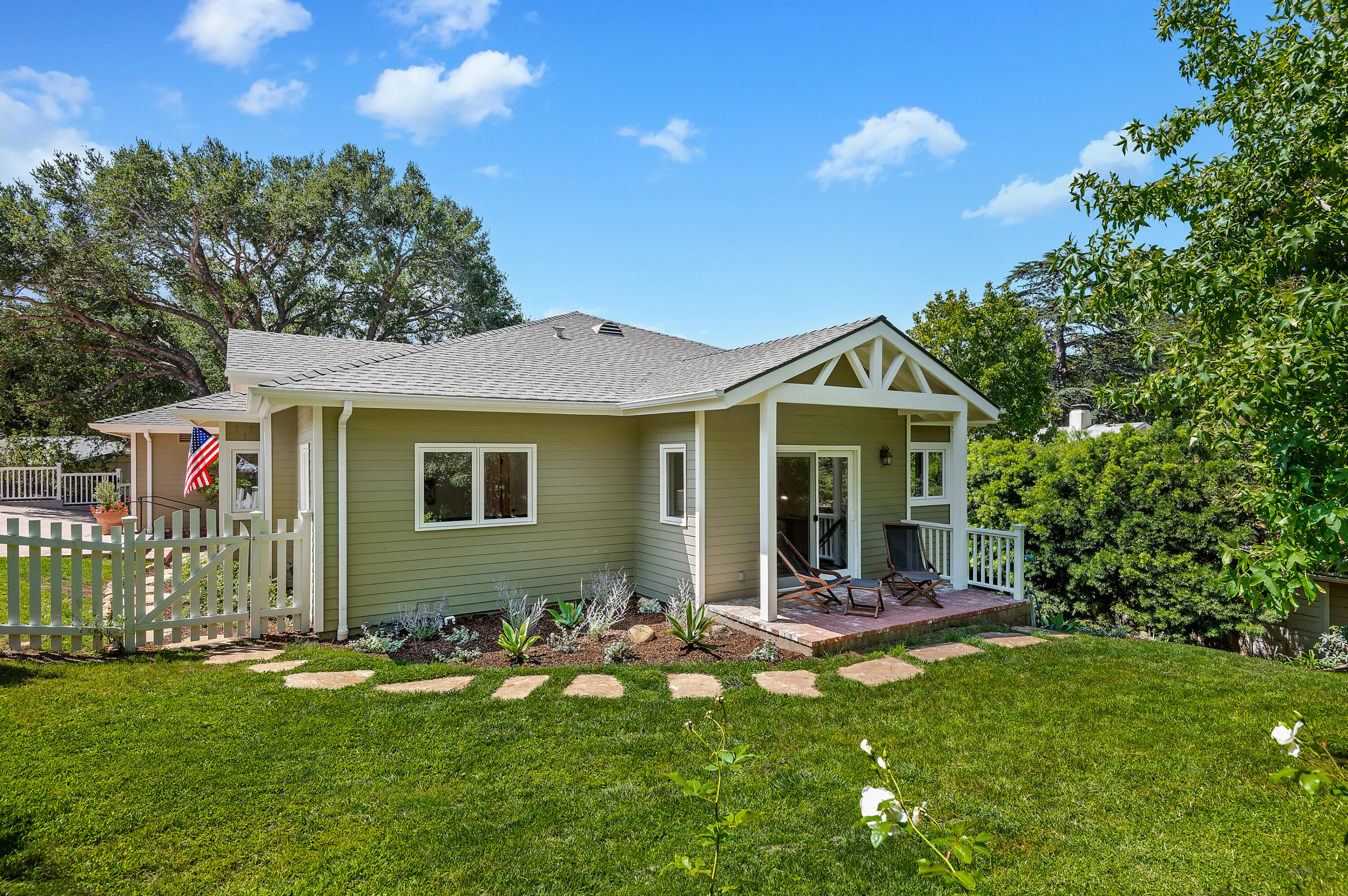 3848-2 Crescent Drive Santa Barbara, CA 93110 - Photo 19 of 32 a view of a house with a yard and porch