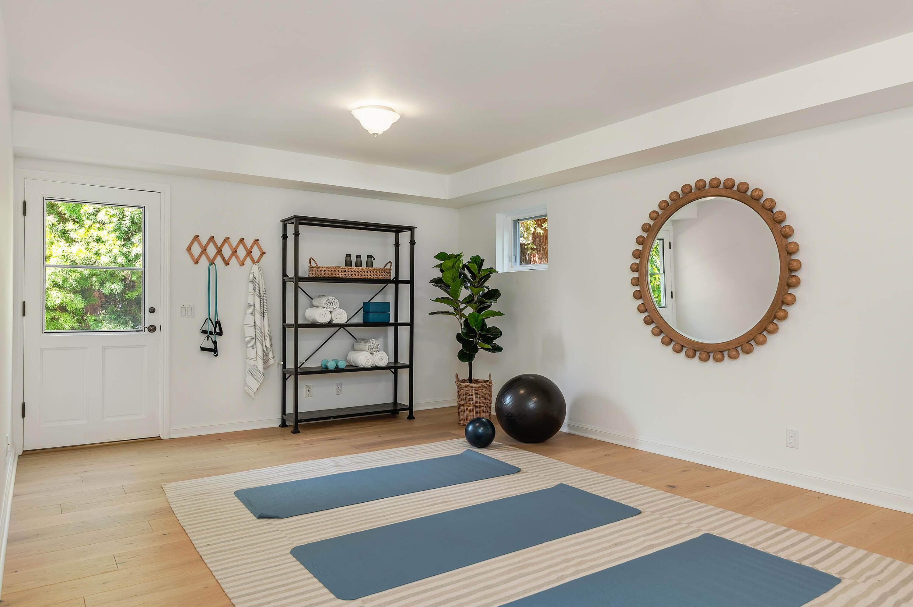 3848-2 Crescent Drive Santa Barbara, CA 93110 - Photo 28 of 32 a view of an empty room with a window and wooden floor