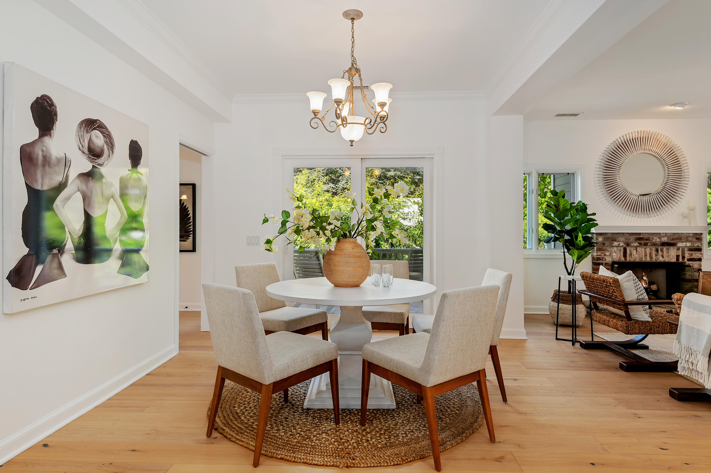 3848-2 Crescent Drive Santa Barbara, CA 93110 - Photo 8 of 32 a view of a dining room with furniture a potted plant and a chandelier