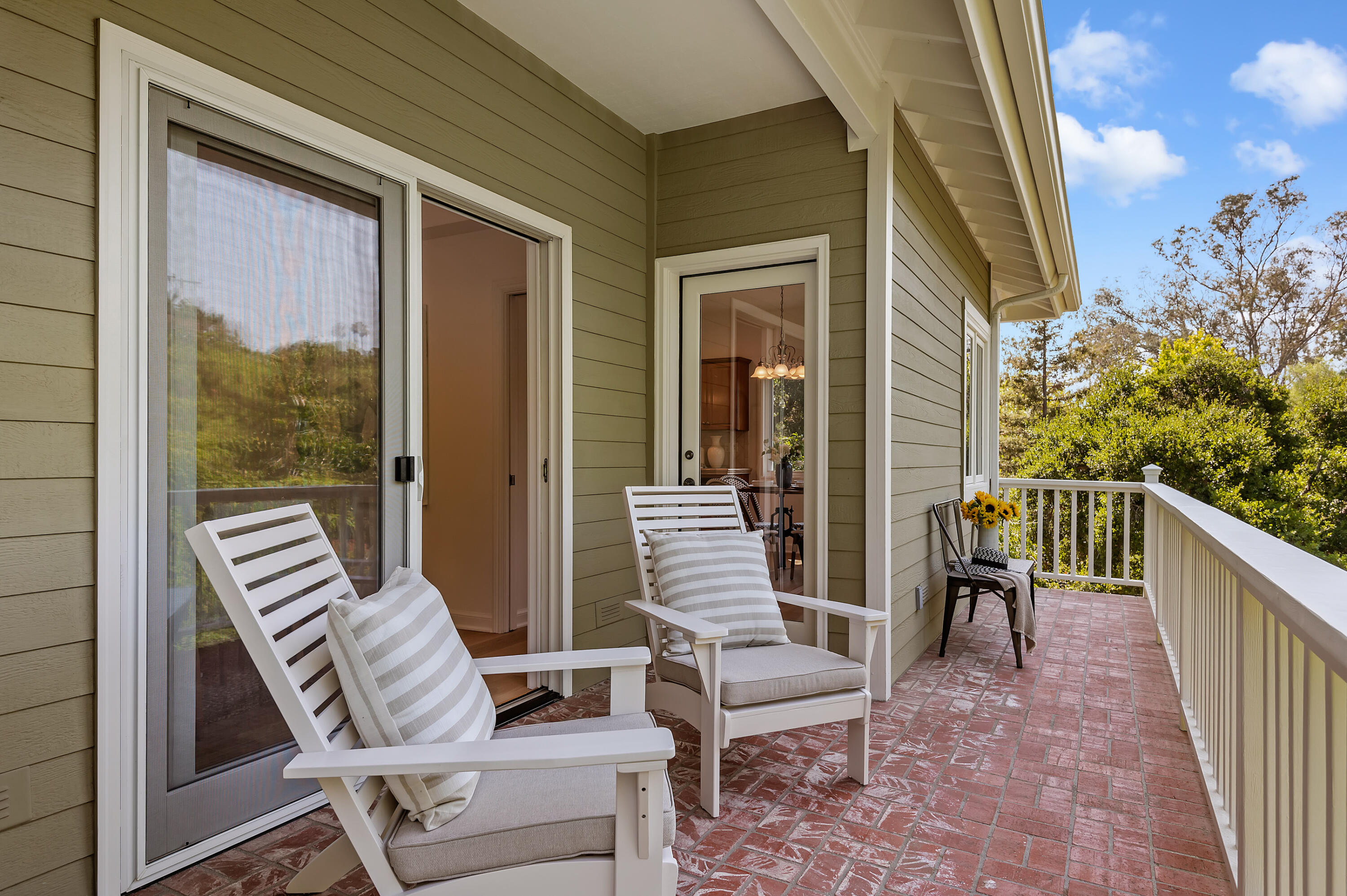 3848-2 Crescent Drive Santa Barbara, CA 93110 - Photo 9 of 32 a balcony with chairs and wooden floor