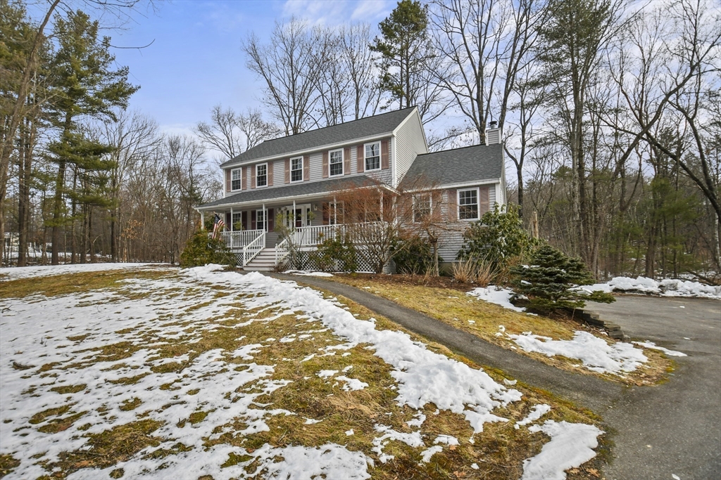 47 Scribner Road Tyngsboro, MA 01879 - Photo 2 of 38 a front view of a house with a yard