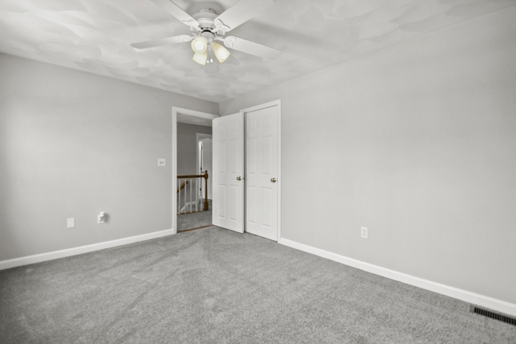 47 Scribner Road Tyngsboro, MA 01879 - Photo 24 of 38 a view of an empty room with a ceiling fan