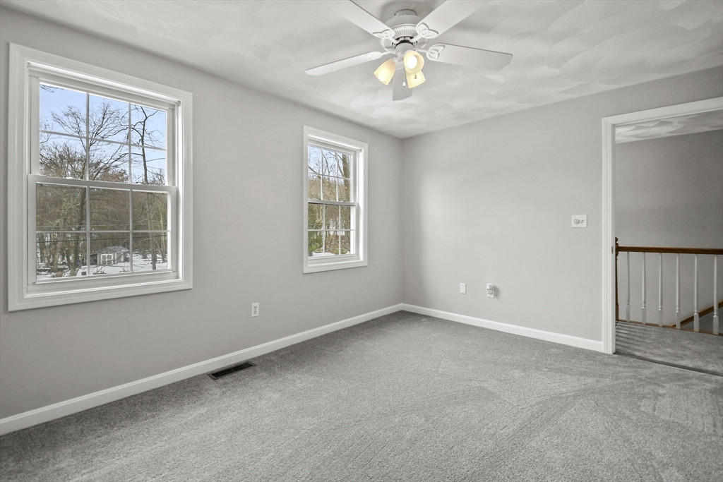 47 Scribner Road Tyngsboro, MA 01879 - Photo 25 of 38 an empty room with a window