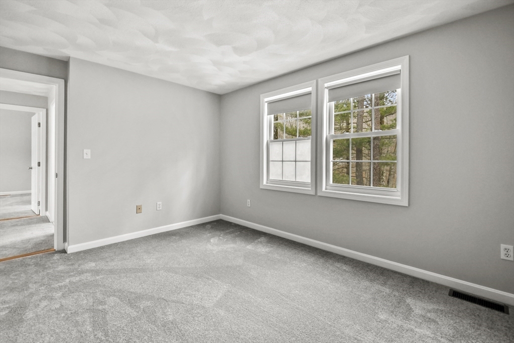 47 Scribner Road Tyngsboro, MA 01879 - Photo 29 of 38 an empty room with a window